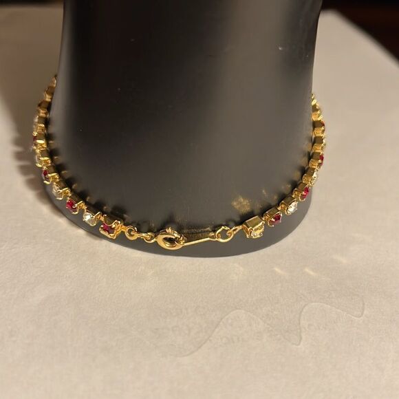 Ladies 8” faux Ruby/Diamond tennis bracelet. - Picture 3 of 5